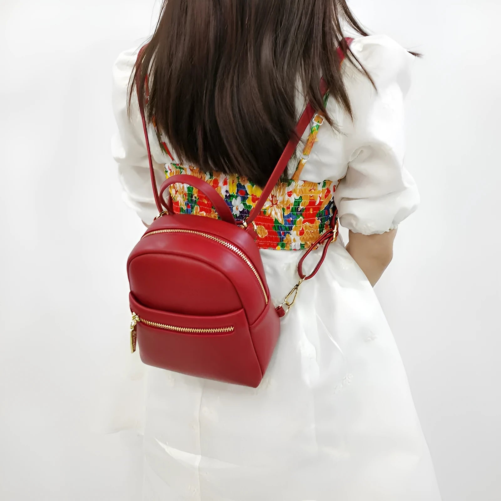 Soft PU leather mini backpack in multiple colours with 3D pockets and internal organisation compartments