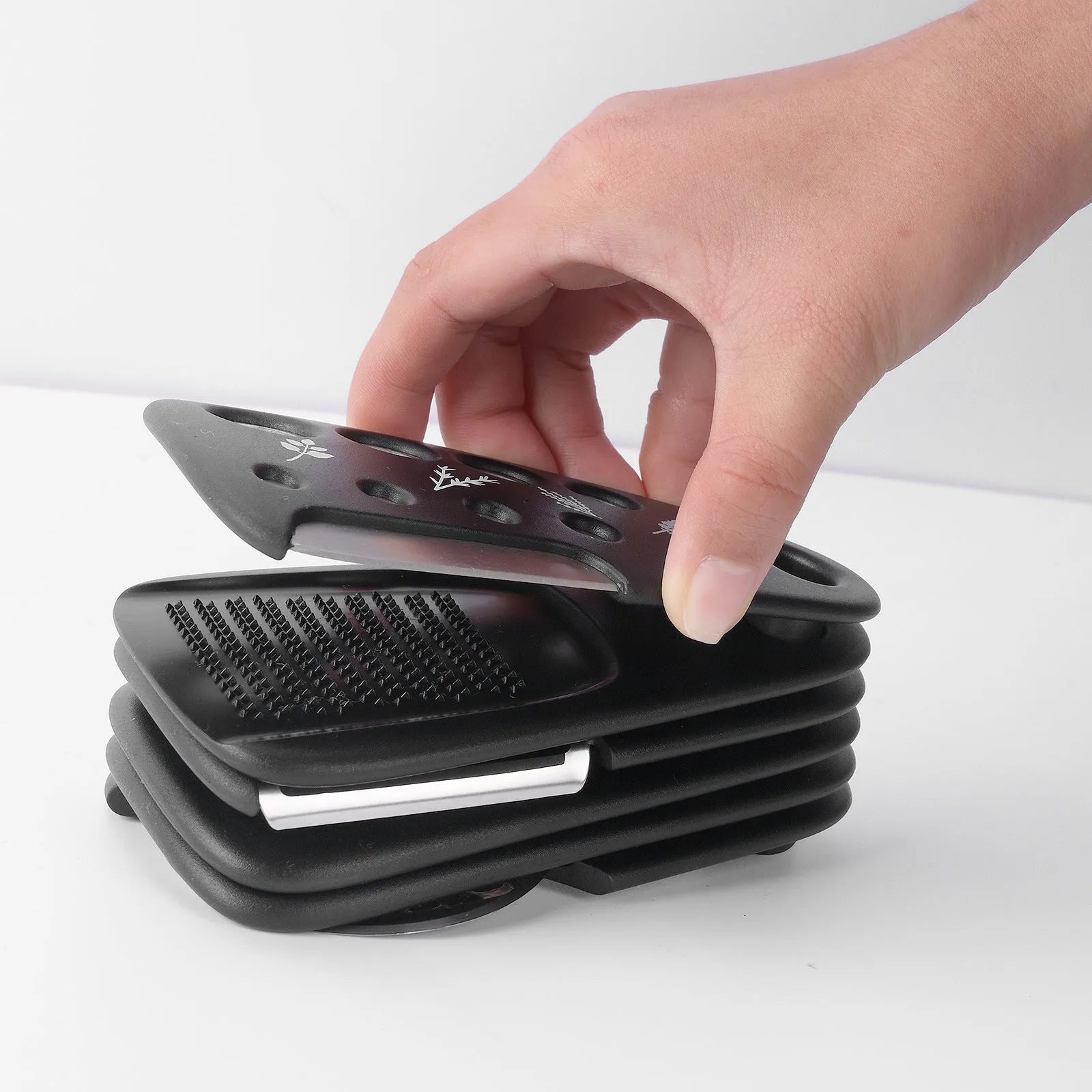 Six stackable kitchen gadgets with utility brush in modern design, made from PP plastic and stainless steel
