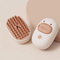 White rechargeable steam pet brush with rubber comb teeth for dog and cat grooming
