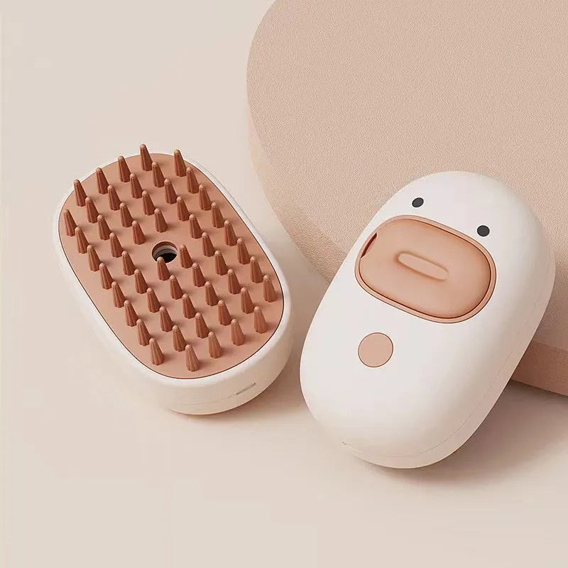 White rechargeable steam pet brush with rubber comb teeth for dog and cat grooming