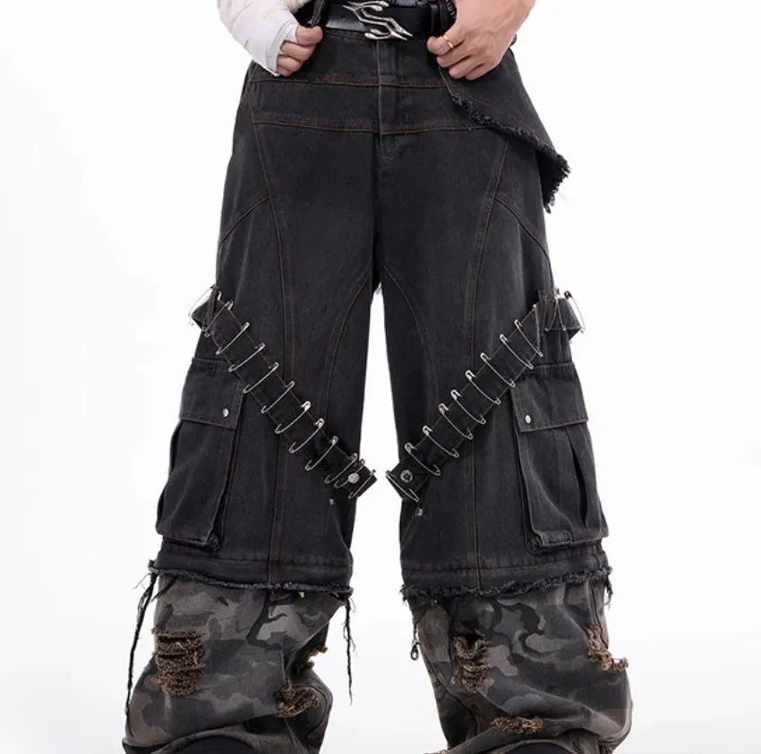 Men's grey and camouflage colour-block jeans with a structured pin and ribbon detail.