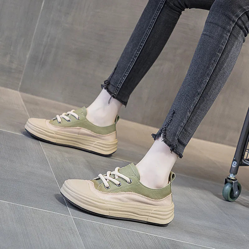 Women's cowhide leather platform sneakers in matcha green with front lace-up design.
