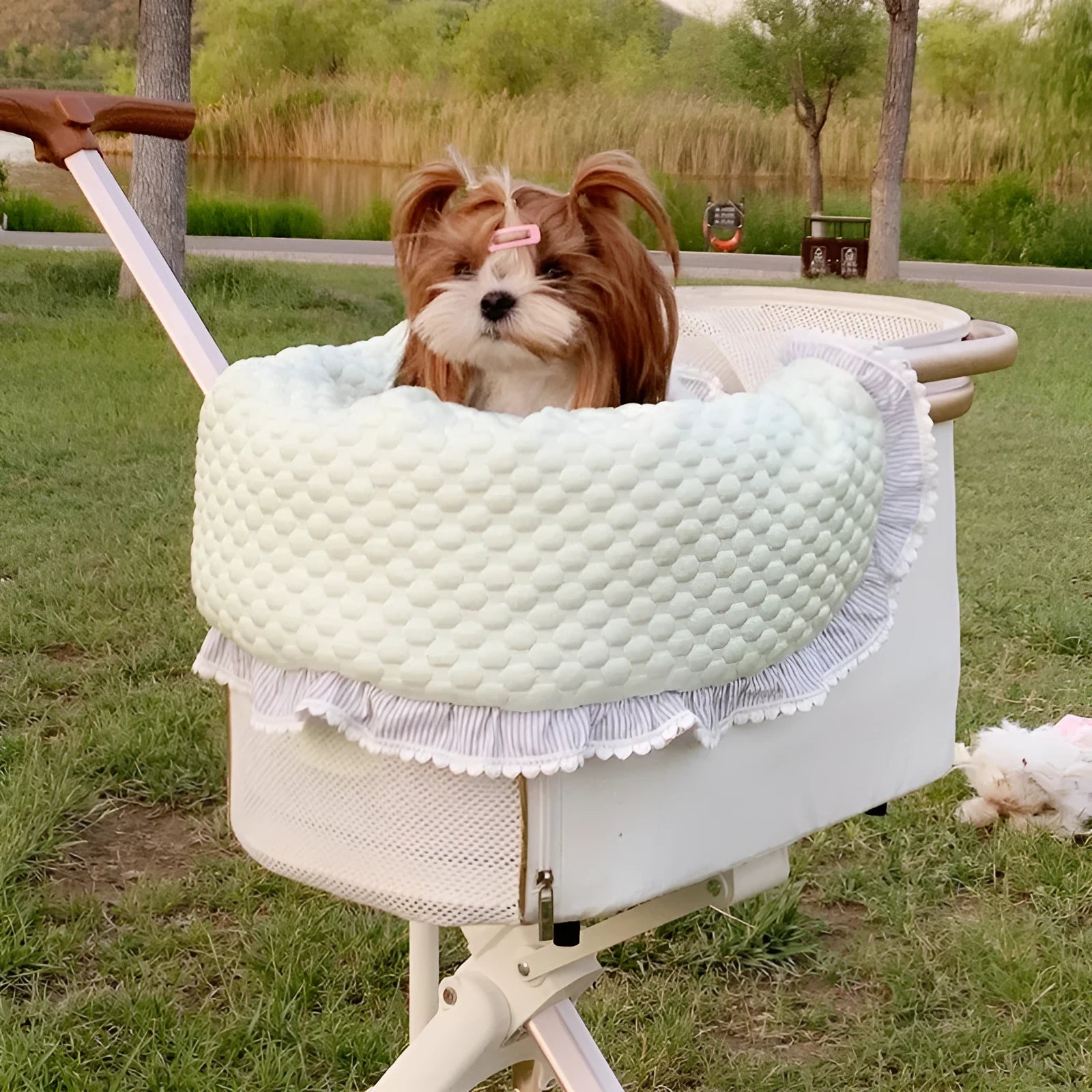 Pet stroller accessory set showing cotton anti-dirty towel, cushion, and pillow in a floral pattern.