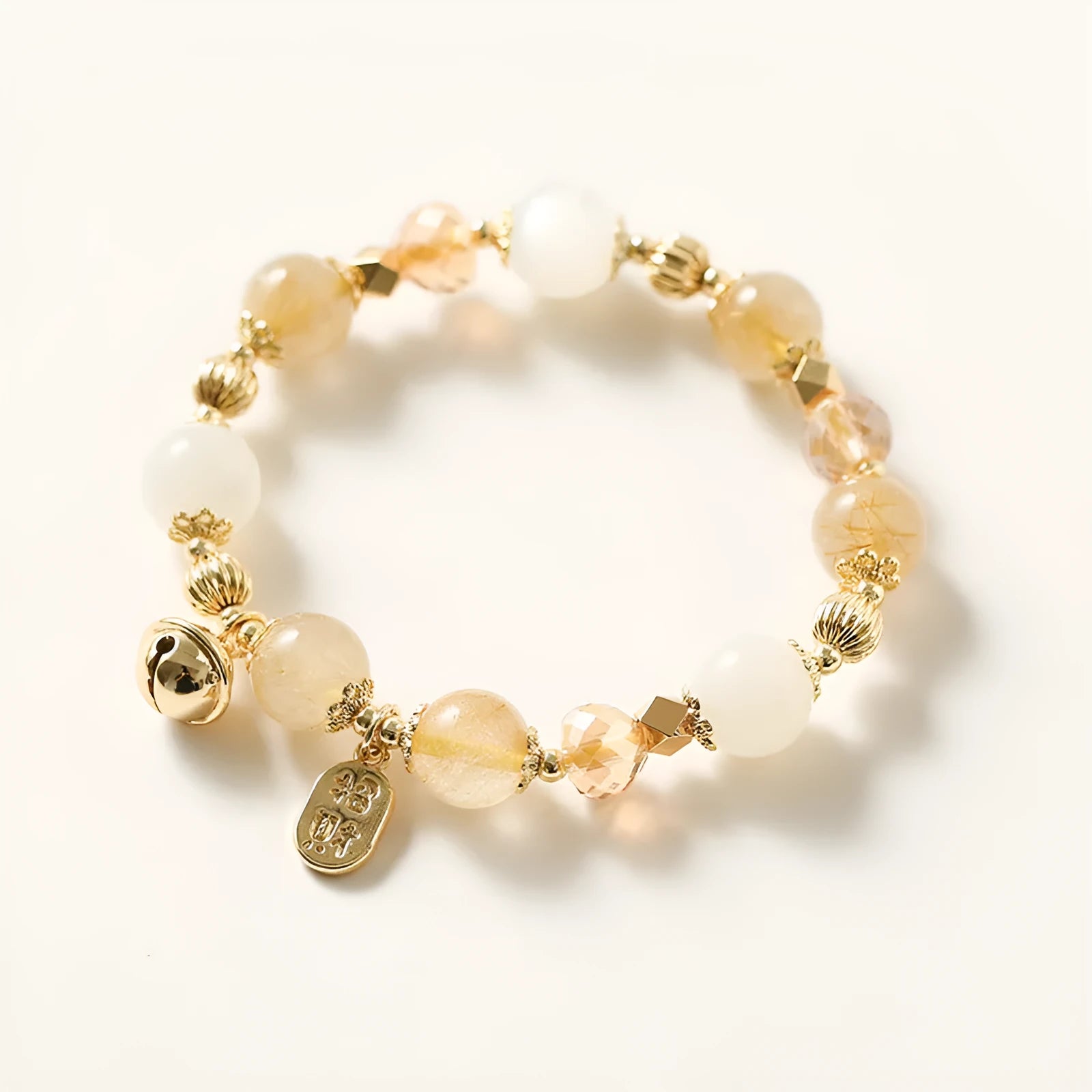 Gold-coloured rutilated quartz bracelet with Korean style design and electroplated crystal construction