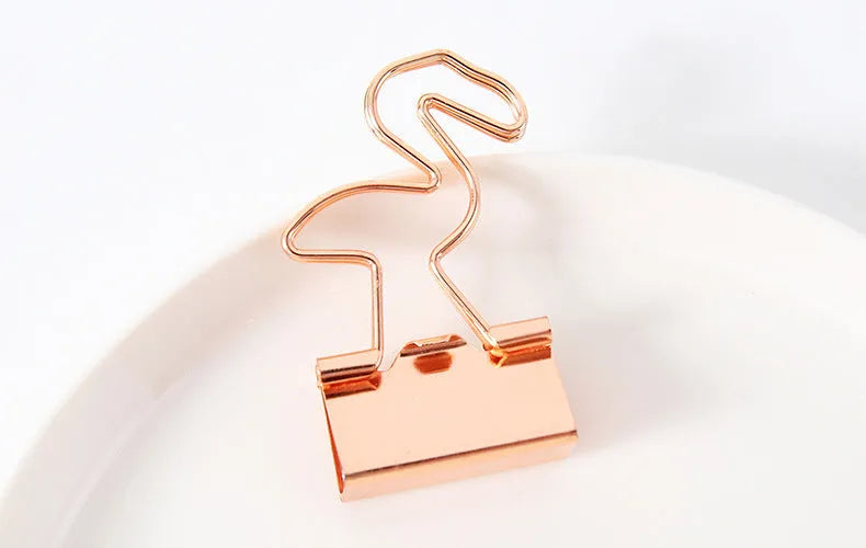Gold-plated long-tail metal clip with a choice of bow, cactus, cat, flamingo, love, or cloud decorative design.
