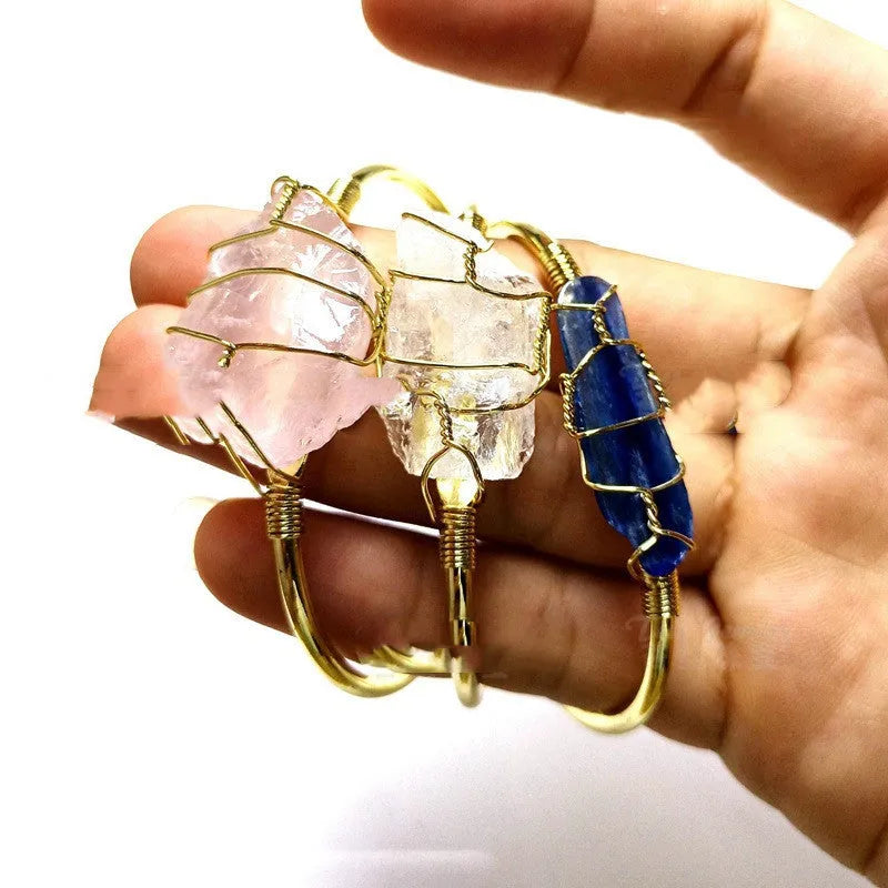 Natural rough crystal stone bracelet with geometric gold tone metal winding, bohemian style.