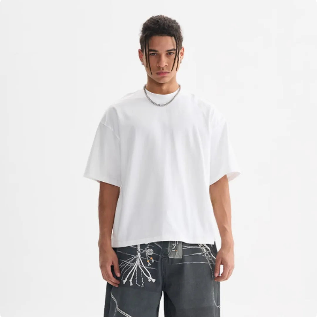 Men's loose fit pure cotton T-shirt in apricot colour on a hanger