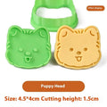 Three dimensional plastic biscuit mold showing puppy head and birthday hat designs