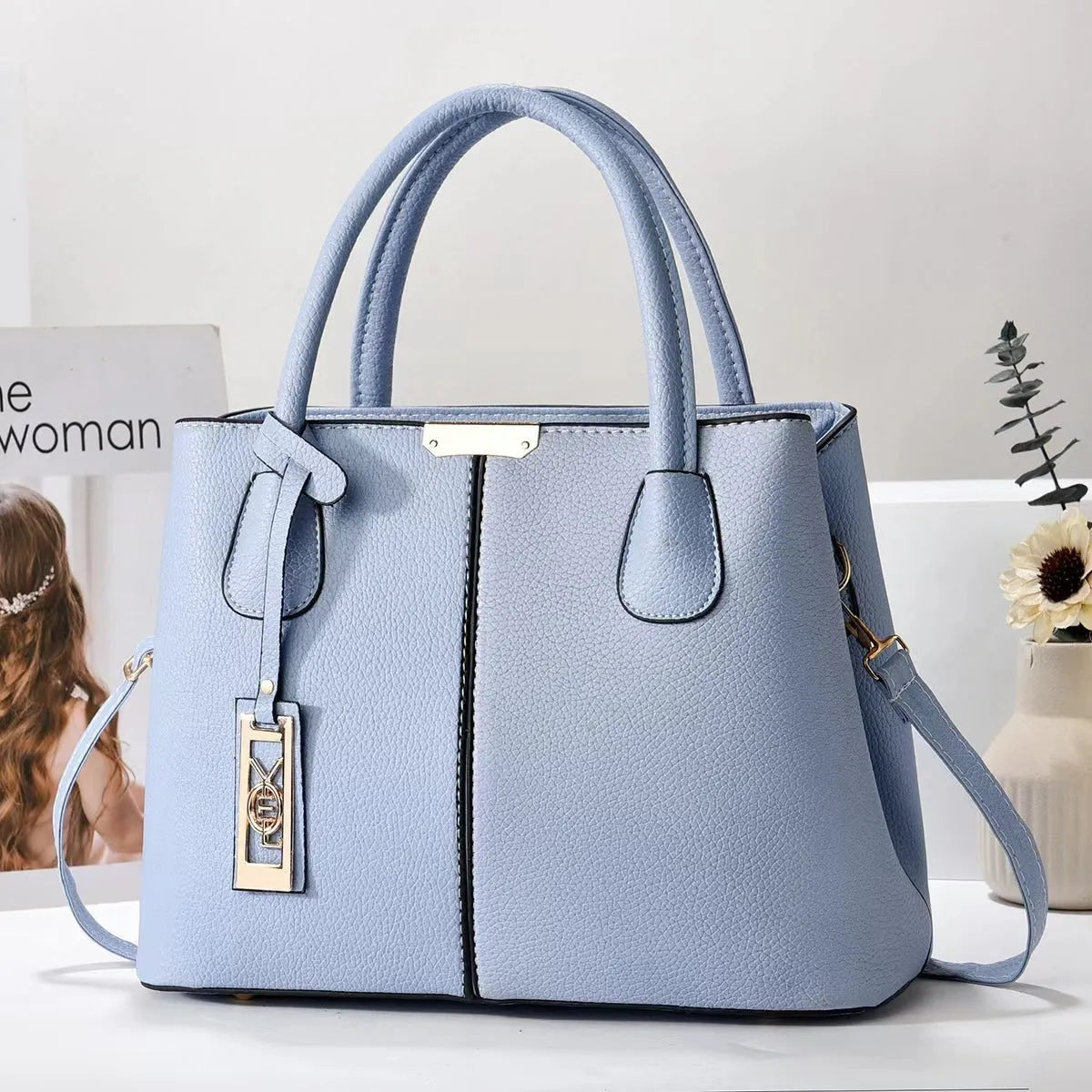 Soft PU women's shoulder bag in horizontal square shape with leather strap, available in multiple colours