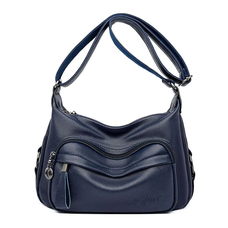 Large black PU shoulder bag with crossbody strap showing multiple internal compartments and zipper closure
