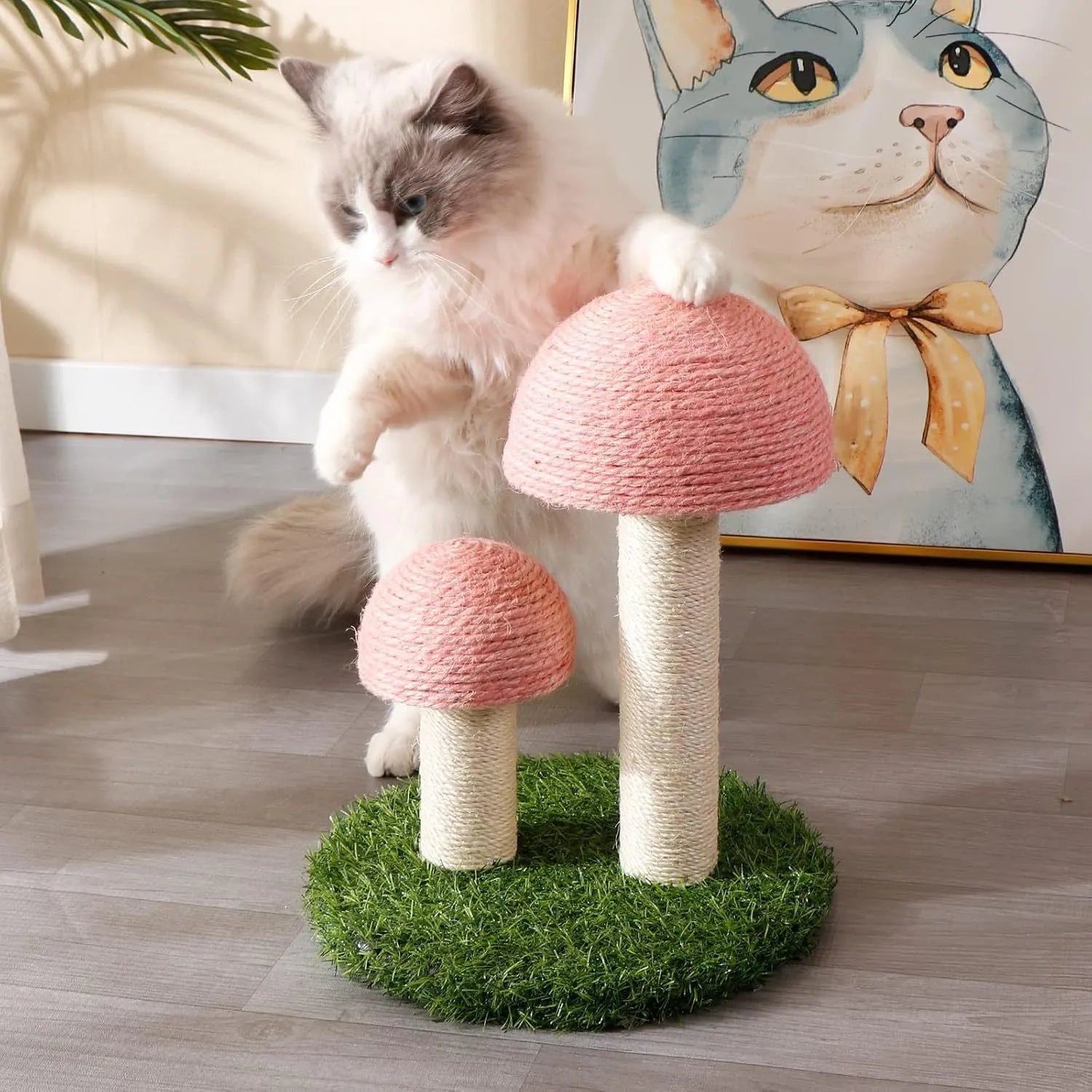 Pink mushroom-shaped cat scratching post made from natural sisal fibre with sturdy base for small cats