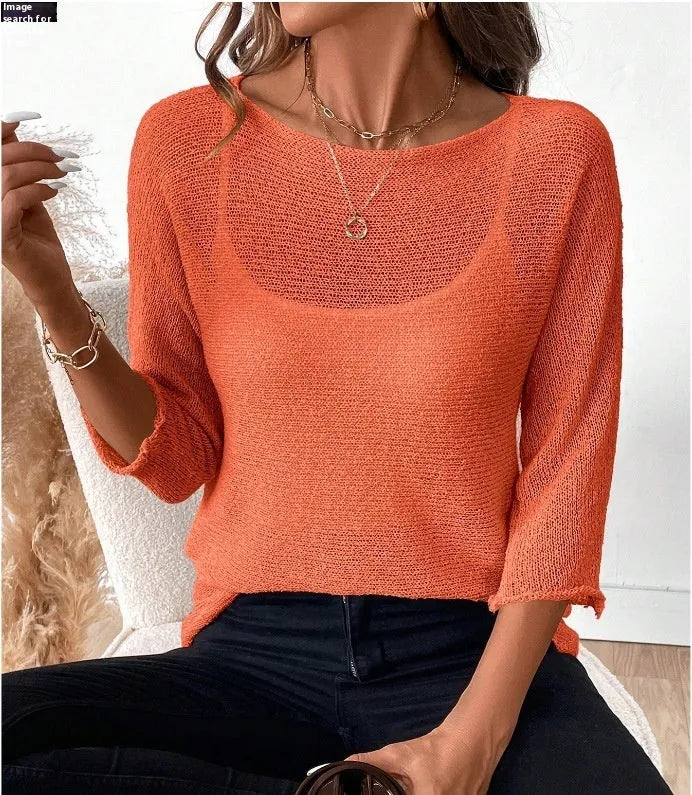 Women's knitted off-shoulder top with 3D pattern in lavender purple colour showing 3/4 sleeve detail