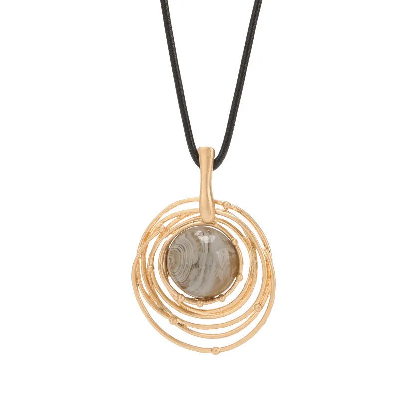 Gold geometric plaid pattern necklace on snakeskin wax rope chain with adjustable length