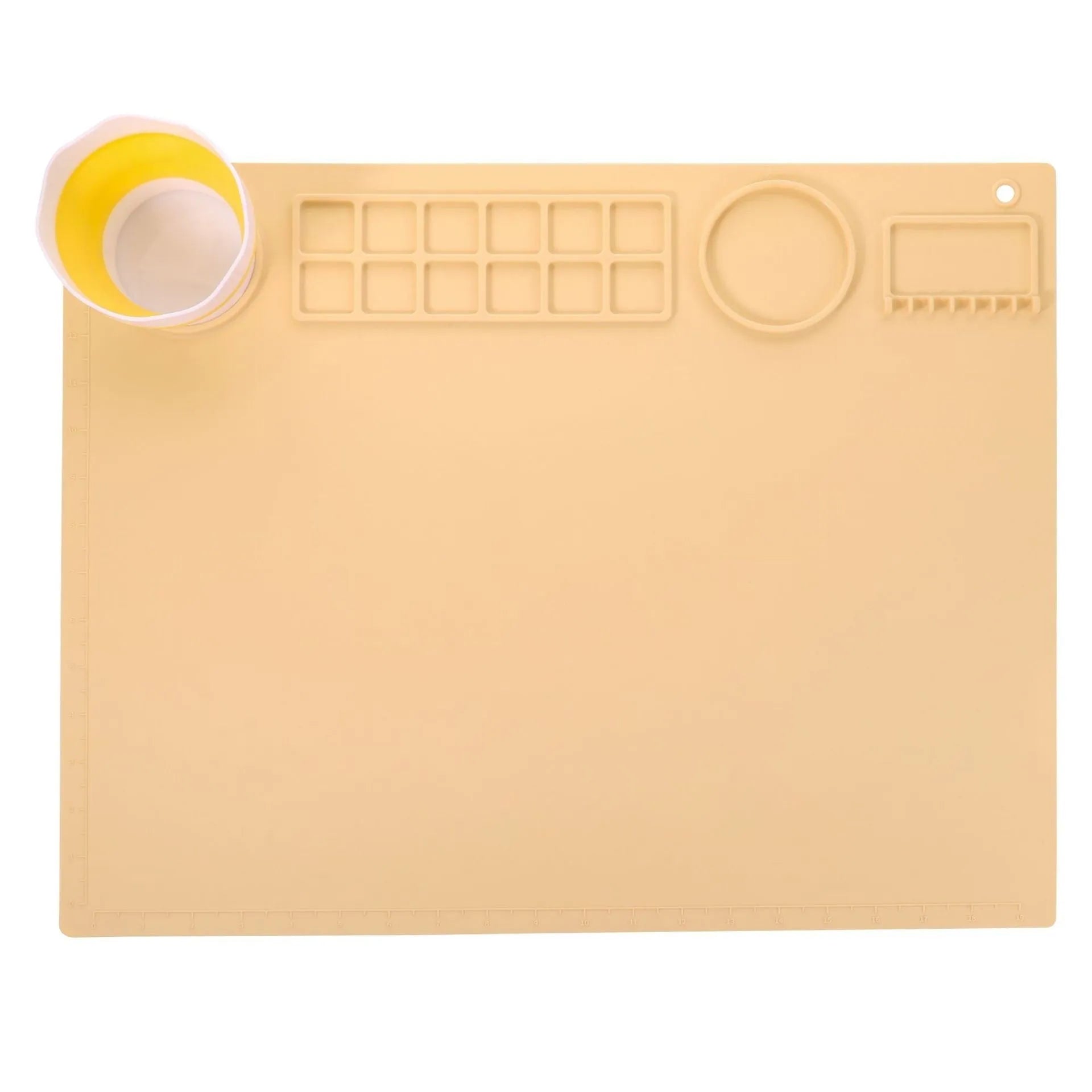 Green silicone painting mat measuring 50x40cm with two round paint mixing bowls on the surface.