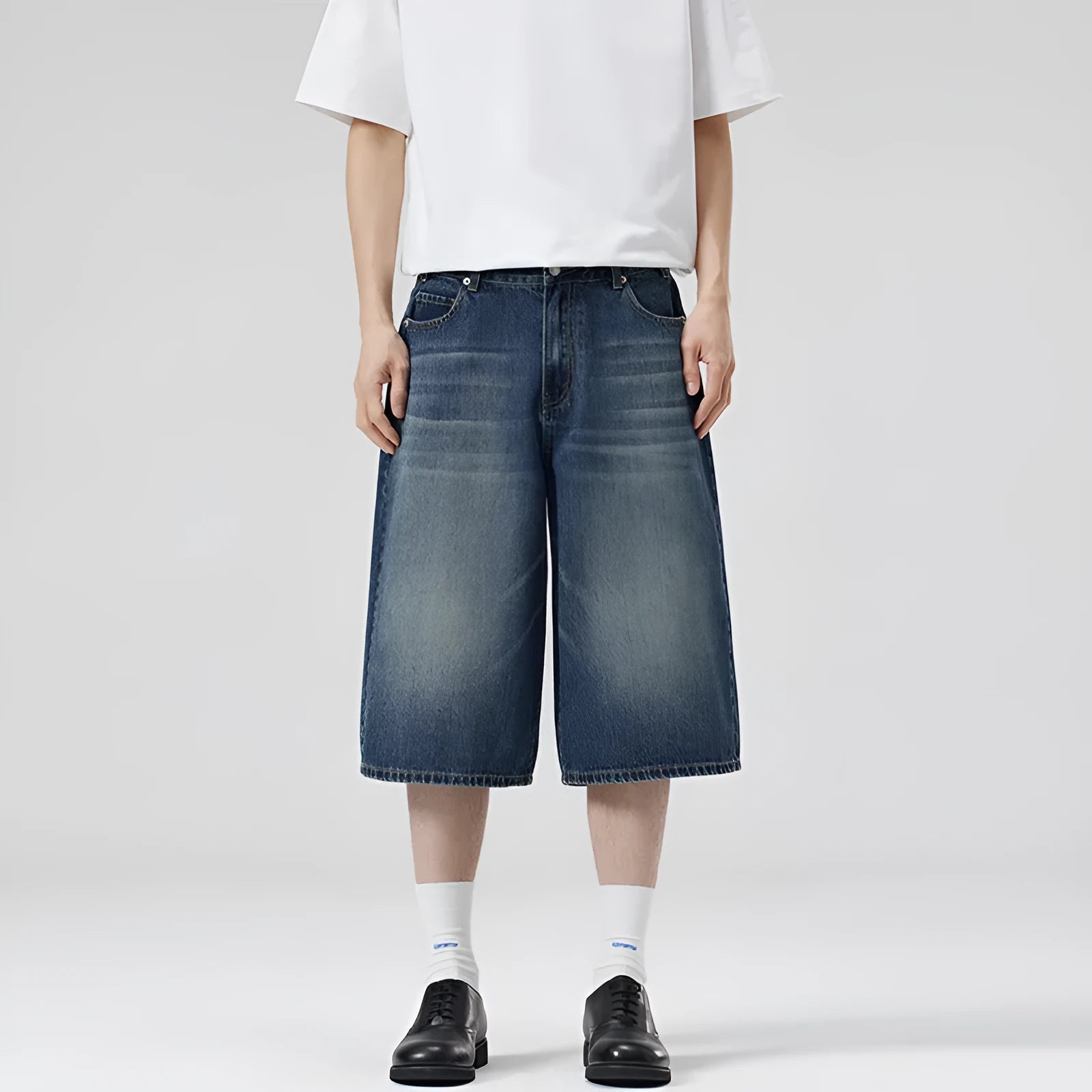 Men's straight-leg denim shorts in light blue with cropped ankle length