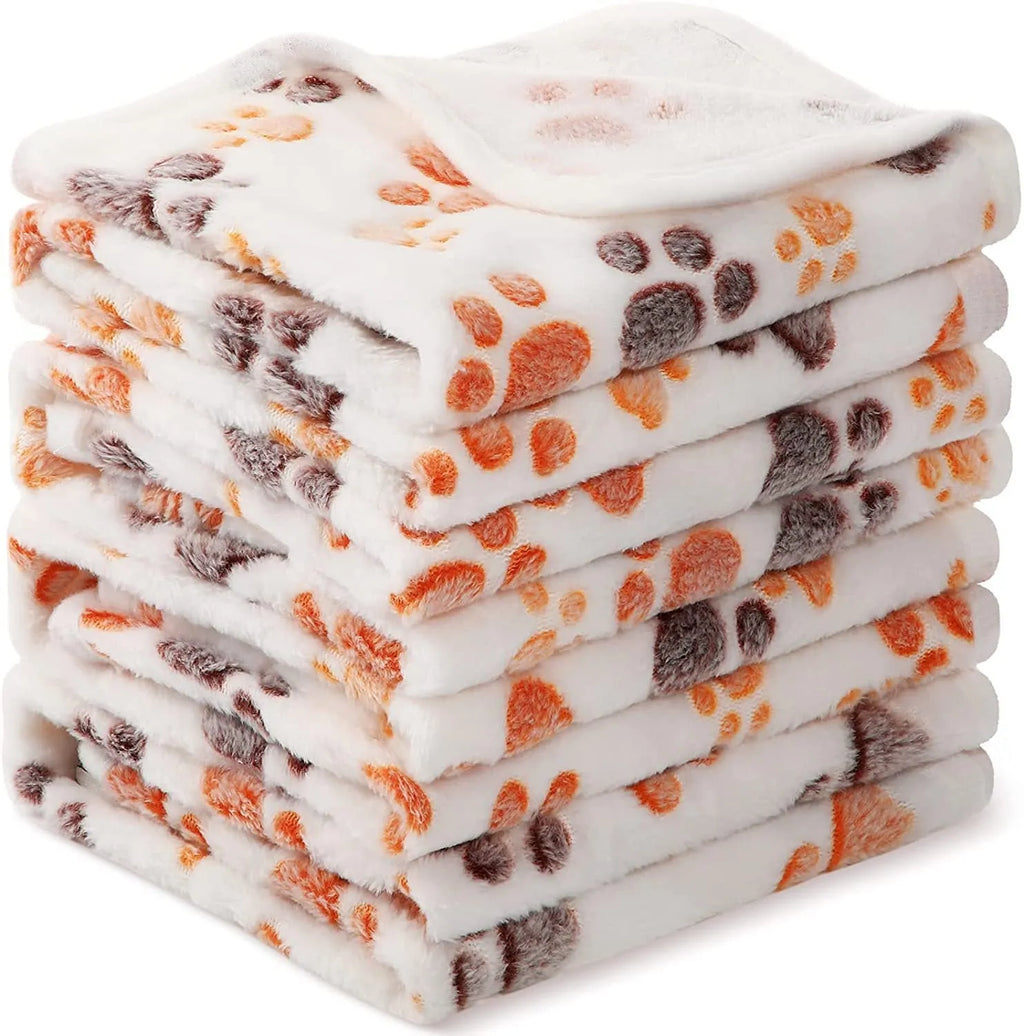 Coral fleece pet blanket with paw print pattern in beige colour, suitable for dogs and cats