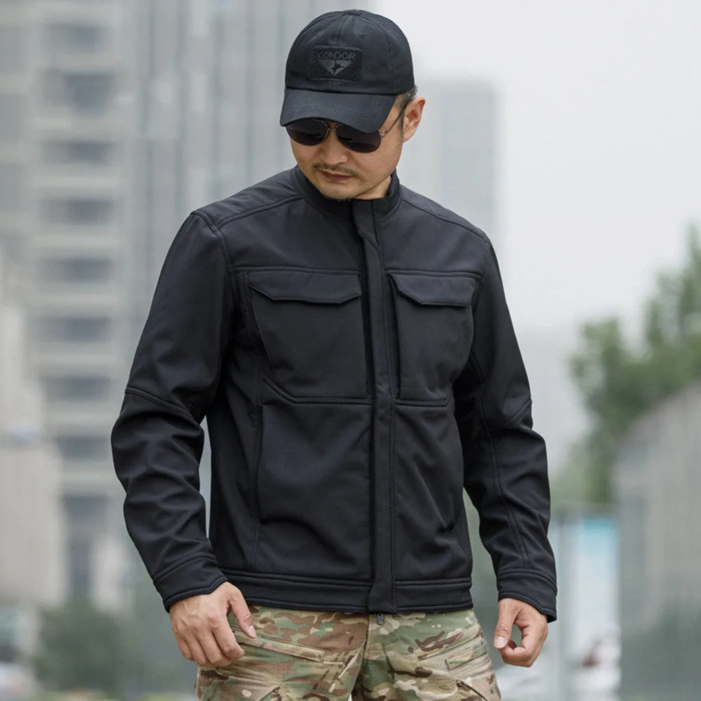 Bone Frog Peak Breaker soft shell tactical jacket in black, shown for outdoor mountaineering use.