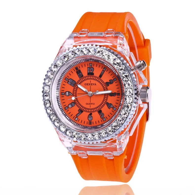 Women's LED luminous quartz watch with round 43mm alloy case and colourful silicone strap options.