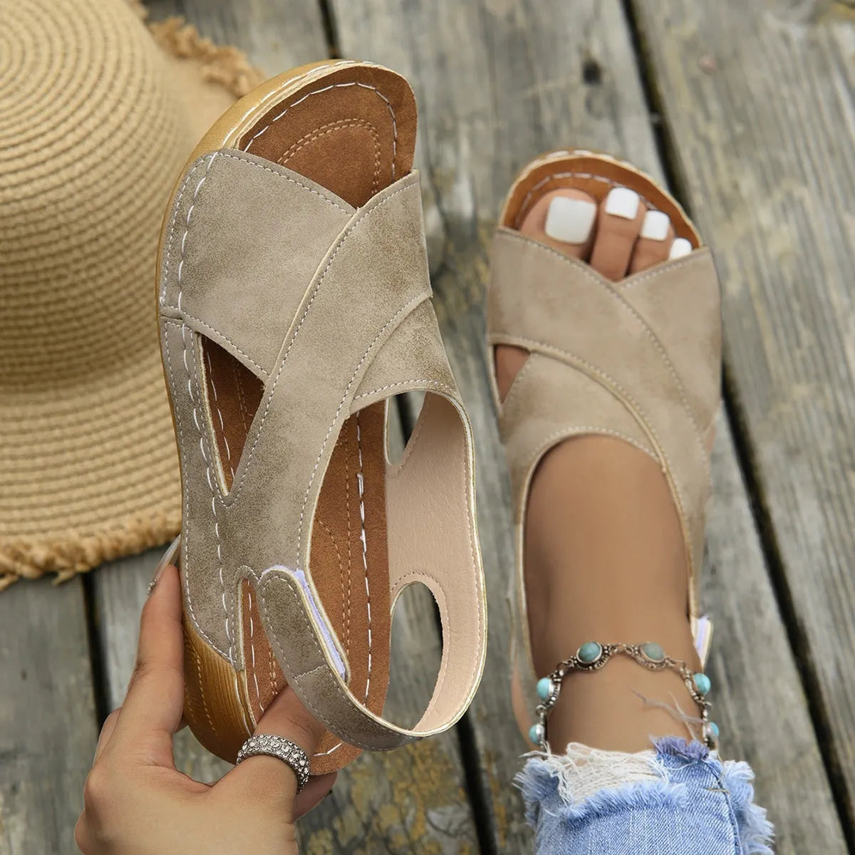 Roman-style women's platform sandals with an open toe and an adjustable Velcro ankle strap.