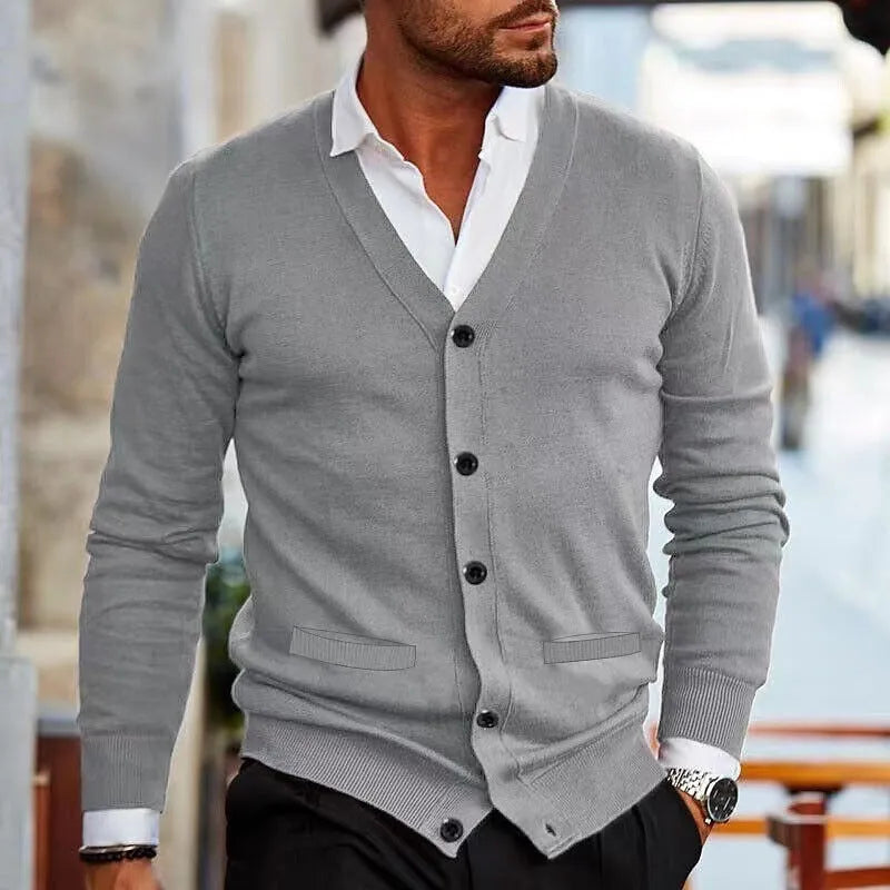 Men's slim fit acrylic cardigan in light grey, shown as a long-sleeved sweater coat open at the front.
