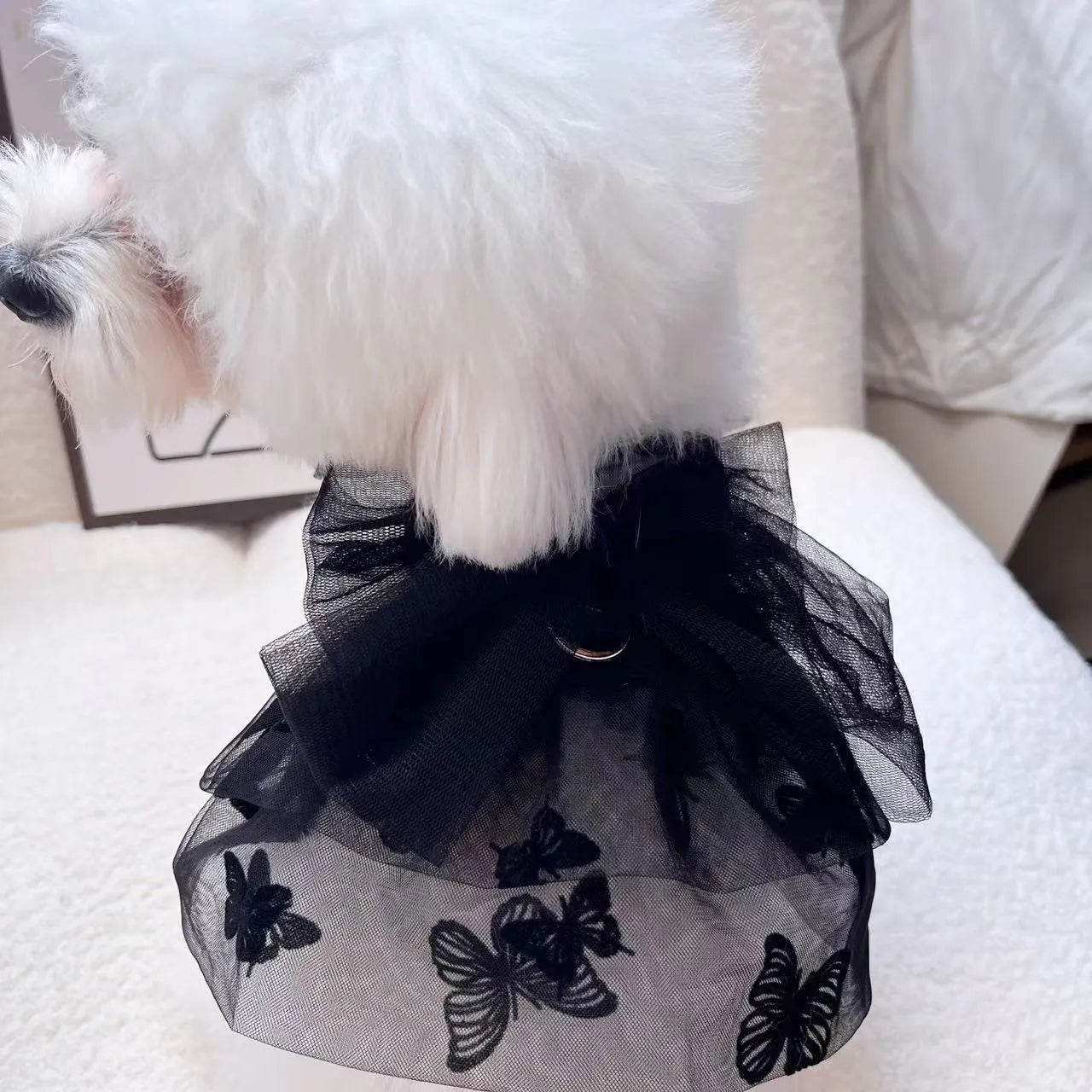 Black gauze princess tulle skirt for a small dog or cat, showing the pet clothing item.