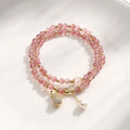 Women's strawberry quartz crystal bracelet with geometric design for money drawing and luck changing
