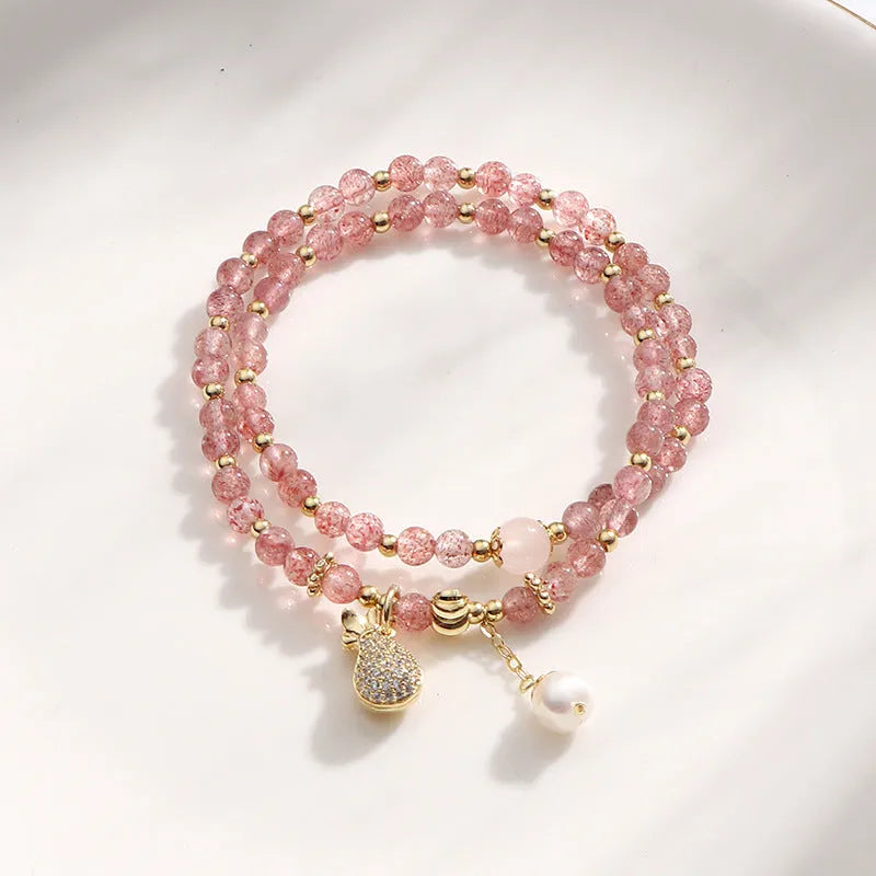 Women's strawberry quartz crystal bracelet with geometric design for money drawing and luck changing