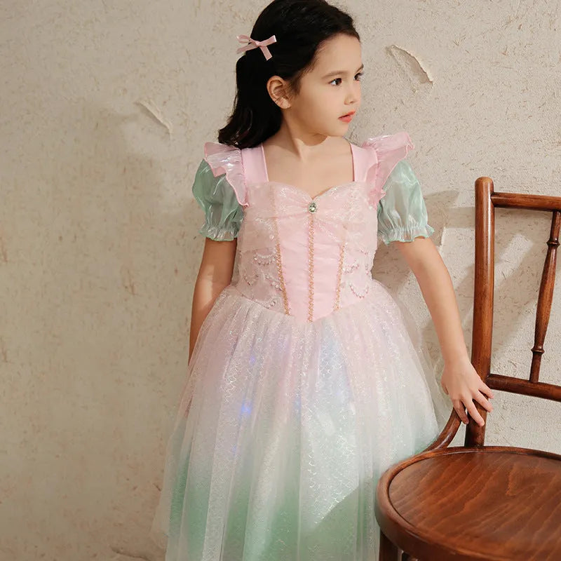 Little girl cotton gauze princess dress with short sleeves, puff sleeve mermaid style, in a solid colour for a wedding or birthday party