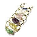 Natural rough crystal stone bracelet with geometric gold tone metal winding, bohemian style.