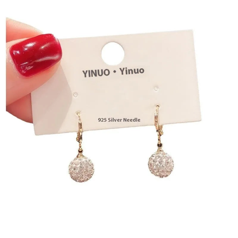 Geometric rose zircon earrings for women in copper with electroplated finish, shown in one of 11 available style variations.