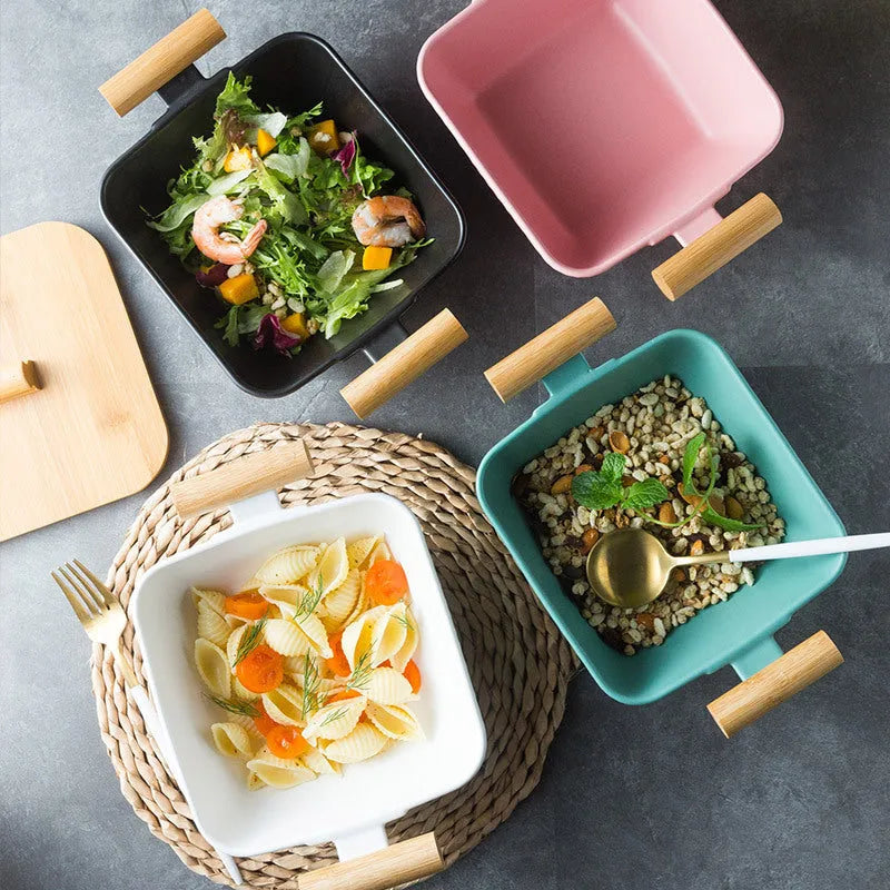 Porcelain ceramic bowl with irregular shape and matching lid in modern design