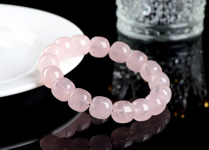 Pink bamboo crystal barrel bead bracelet with 11-12mm geometric design
