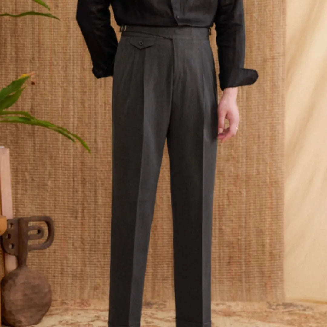Men's slim fit straight leg trousers in dark grey, light brown, and light apricot colours on a hanger.