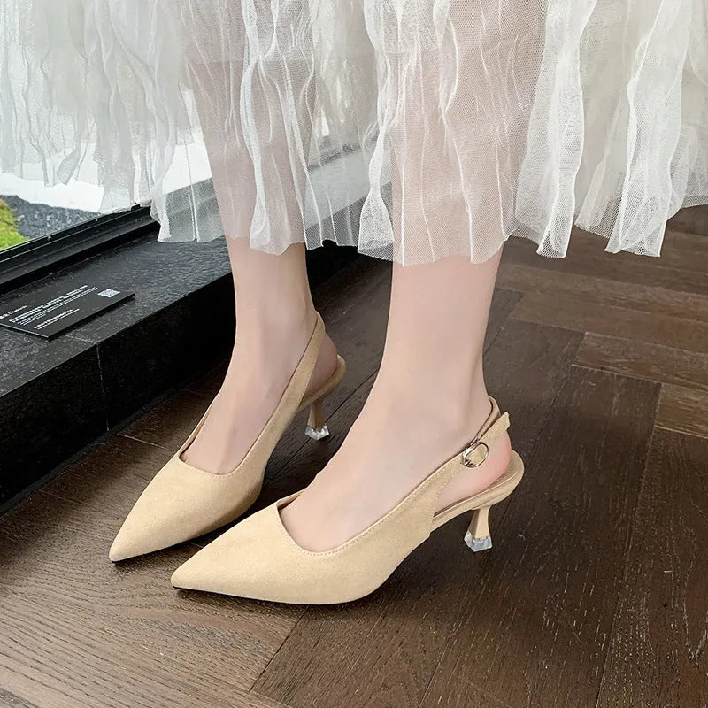 Pointed toe stiletto high heel shoe in suede with a rubber sole.
