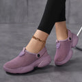 Women's Flyknit sports sandals in beige colour showing round toe holder and breathable upper construction