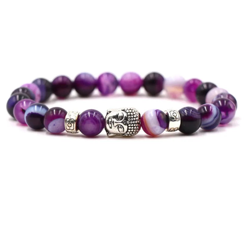 Natural stone stretch bracelet with tigereye, volcanic rock and turquoise beads on wrist