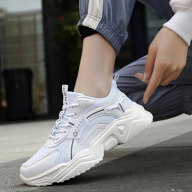 Women's white mesh casual sports shoes with round toe and buckle detail