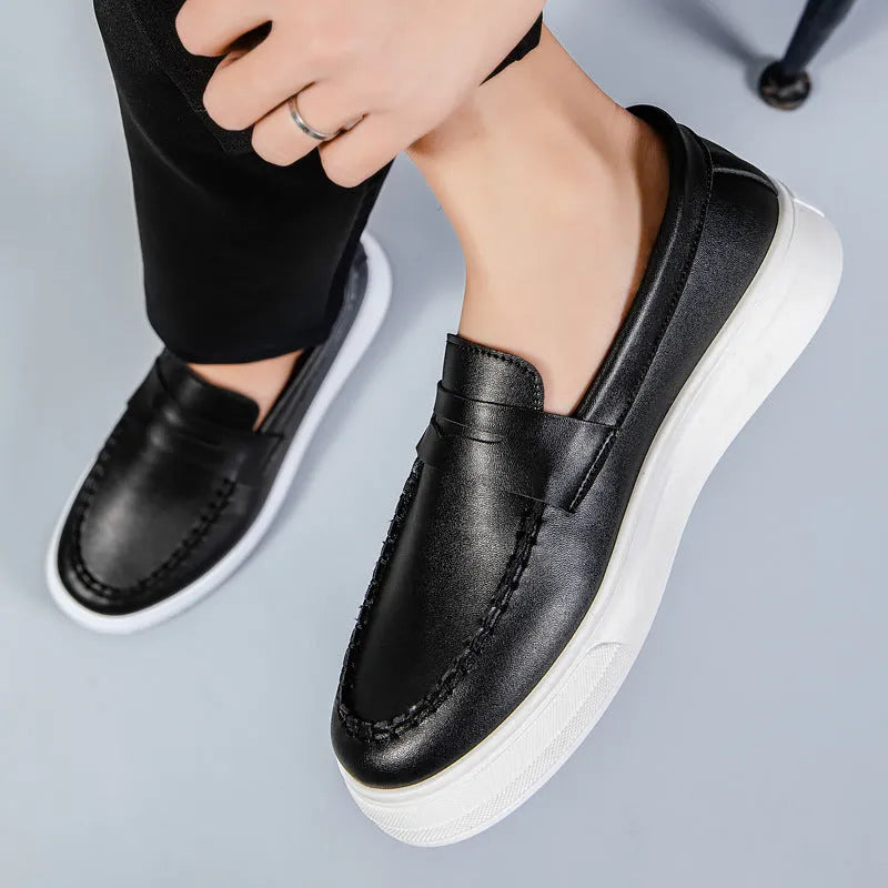 PU leather casual slip-on shoes in round toe design available in white, black and white, and khaki colour options
