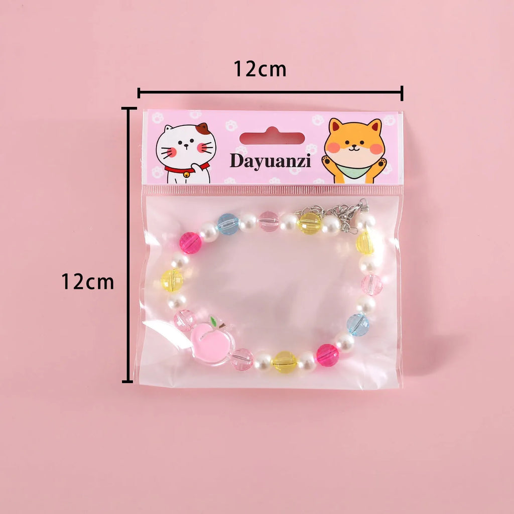 Colourful plastic pearl pet necklace with small flower, rainbow, or peach bead designs for cats