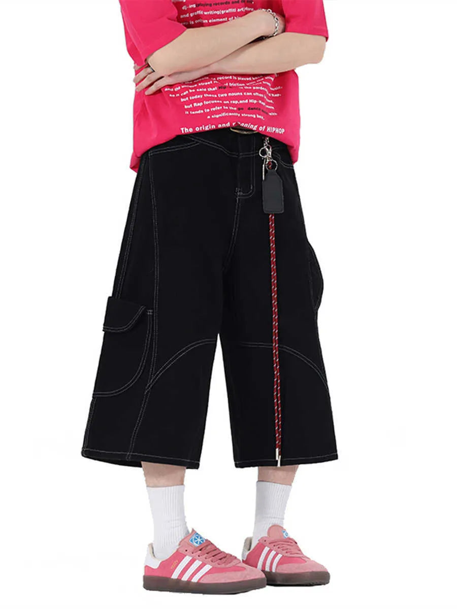 Retro denim workwear shorts with wide leg design and multiple pockets in black colour