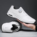 Black and white low-top mesh casual tennis shoes with lace-up front and cross shoulder straps