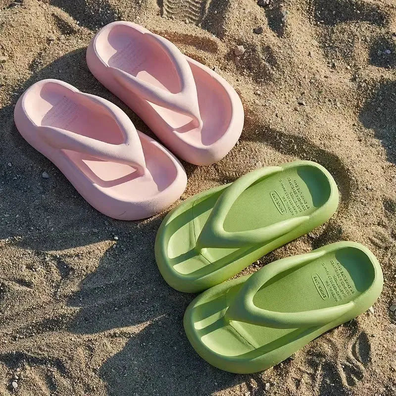 Solid colour thick-soled flip flops with decorative bow and injection moulded EVA construction