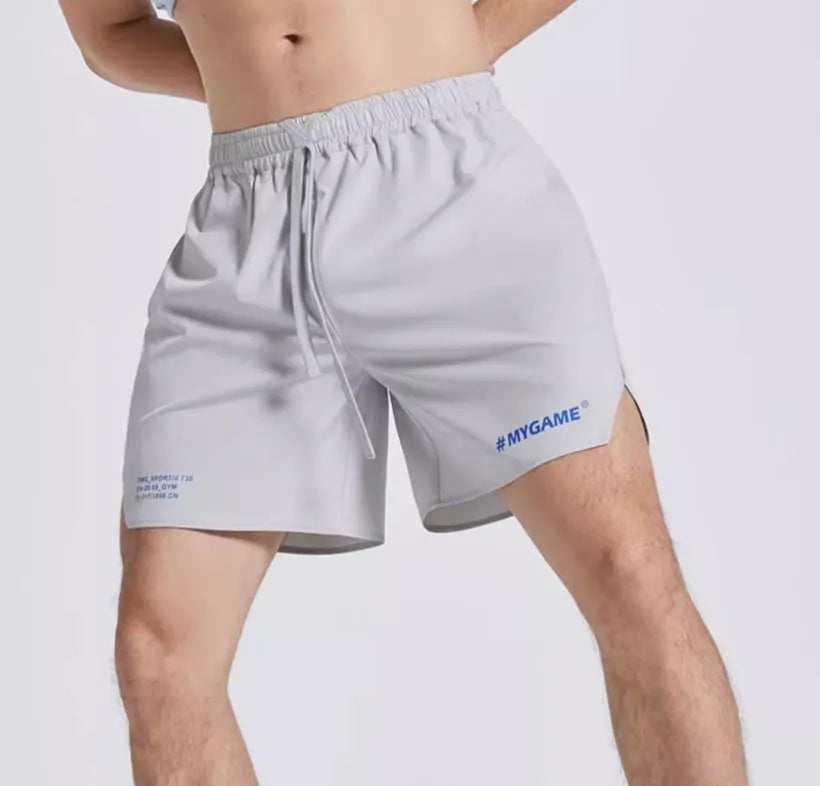 Men's fitness training shorts in midnight blue with moisture-wicking fabric and four-point stretch construction
