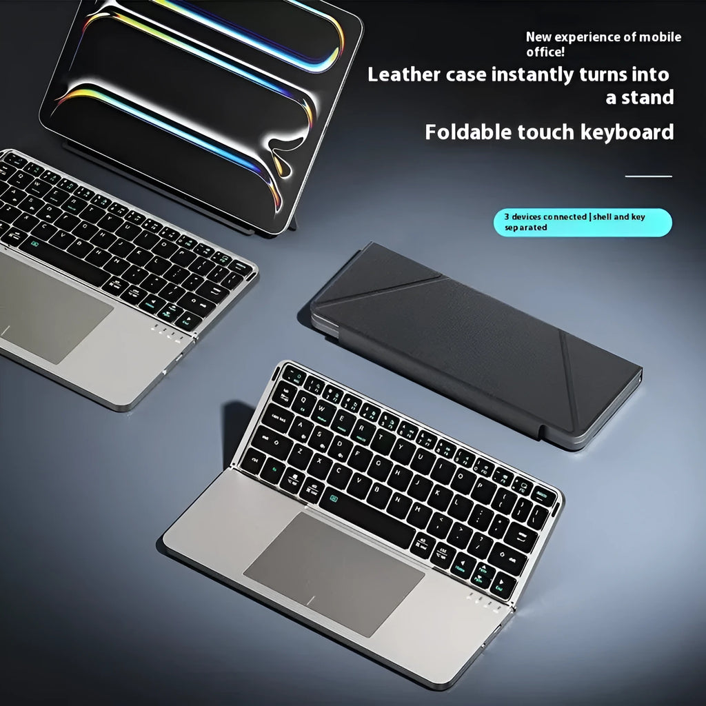 Grey folding Bluetooth keyboard for phablet and tablet devices showing compact folded position