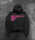 Man wearing a black heavyweight hooded sweater with a large white letter print design on the front.