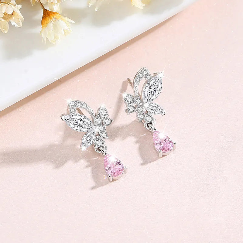 Crystal butterfly stud earrings in 925 silver with clear crystal accents on wings