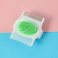 Blue or green multifunctional pet grooming comb with floating hair removal system measuring 8.5cm long