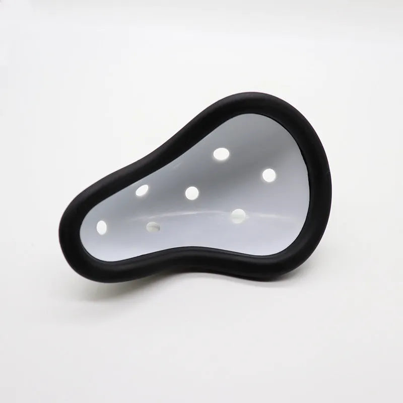 Rubber genital protector for adult and child sports safety in hockey, rugby, and martial arts.