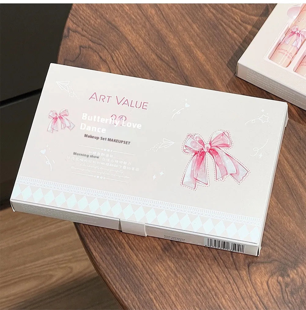 Butterfly Box makeup set with four lip muds, powder blusher, and butterfly necklace