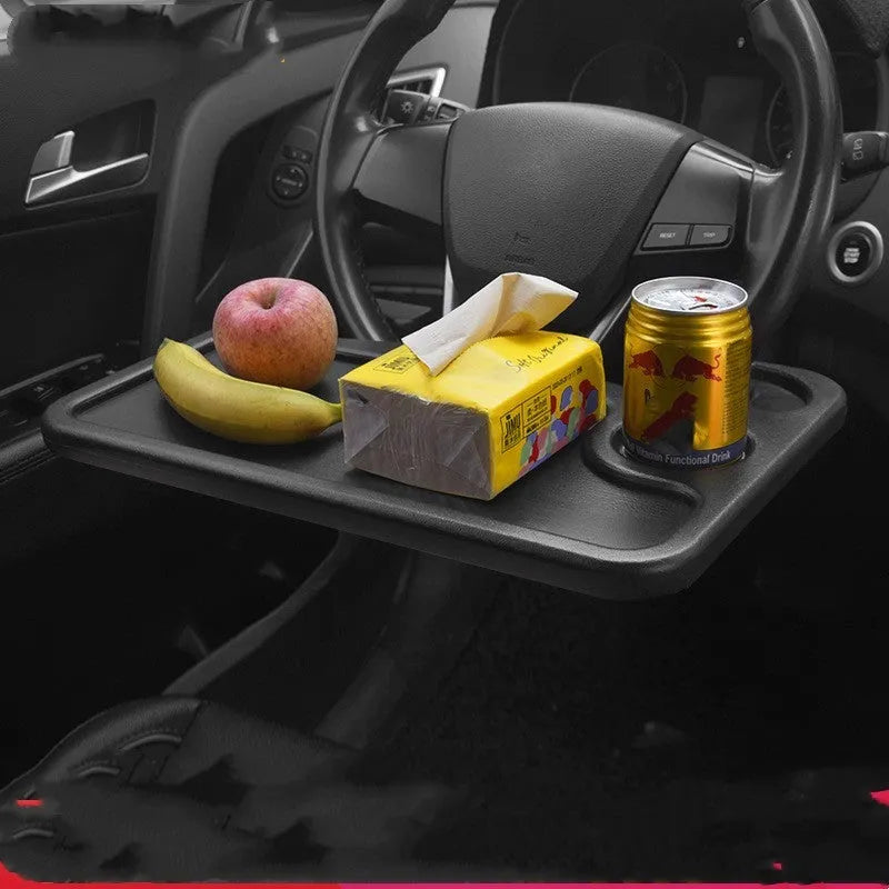 Black plastic car desk and storage stand with food tray, dimensions 42cm by 28cm.